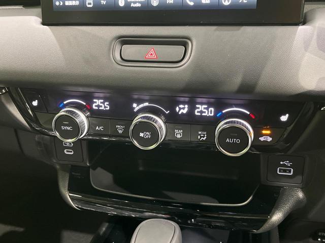 ヴェゼル ｅ：ＨＥＶ　Ｚ　登録済未使用車　９型コネクトナビ　マルチビューカメラ　ハンズフリーパワーバックドア　ホンダセンシング　アダプティブクルーズ　ブラインドスポットモニター　ＬＥＤヘッド　シーケンシャルターン　スマートキー（26枚目）