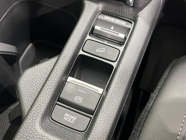 ヴェゼル ｅ：ＨＥＶ　Ｚ　登録済未使用車　９型コネクトナビ　マルチビューカメラ　ハンズフリーパワーバックドア　ホンダセンシング　アダプティブクルーズ　ブラインドスポットモニター　ＬＥＤヘッド　シーケンシャルターン　スマートキー（32枚目）