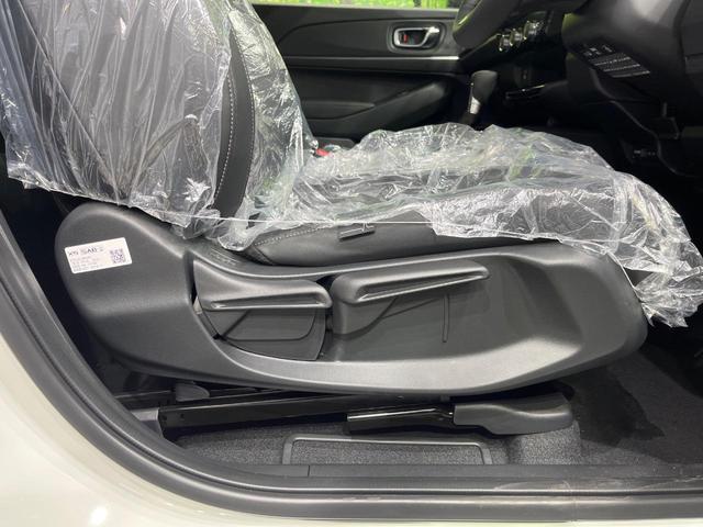 ヴェゼル ｅ：ＨＥＶ　Ｚ　登録済未使用車　９型コネクトナビ　マルチビューカメラ　ハンズフリーパワーバックドア　ホンダセンシング　アダプティブクルーズ　ブラインドスポットモニター　ＬＥＤヘッド　シーケンシャルターン　スマートキー（49枚目）