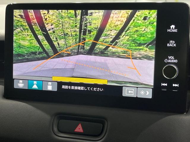 ヴェゼル ｅ：ＨＥＶ　Ｘ　純正９型コネクトナビ　バックカメラ　ホンダセンシング　アダプティブクルーズ　パーキングセンサー　ＬＥＤヘッドライト　ワイヤレス充電　スマートキー　オートエアコン　ＥＴＣ　ステアリングスイッチ　禁煙車（5枚目）