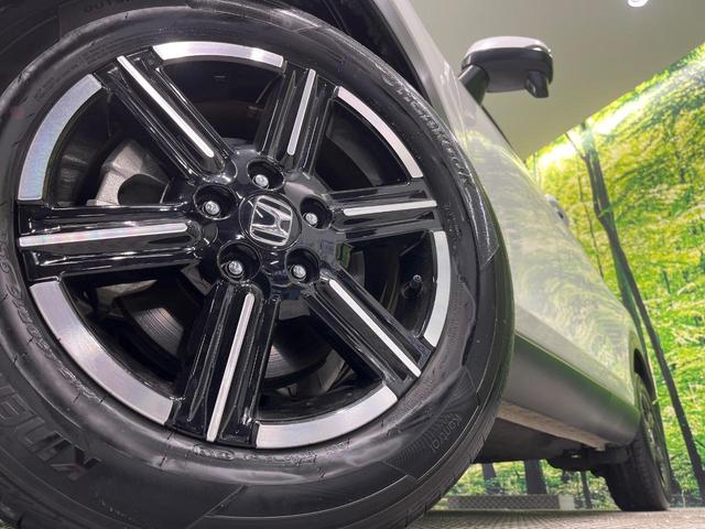 ヴェゼル ｅ：ＨＥＶ　Ｘ　純正９型コネクトナビ　バックカメラ　ホンダセンシング　アダプティブクルーズ　パーキングセンサー　ＬＥＤヘッドライト　ワイヤレス充電　スマートキー　オートエアコン　ＥＴＣ　ステアリングスイッチ　禁煙車（13枚目）