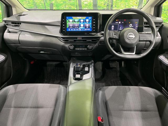 ノート Ｘ　純正９型ナビ　ＬＥＤヘッドライト　オートライト　インテリキー　エマージェンシーブレーキ　ステアリングスイッチ　オートエアコン　ハイビームアシスト　後席リクライニング機能　電動格納ミラー　禁煙車（2枚目）