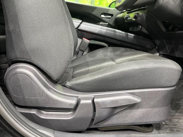 ノート Ｘ　純正９型ナビ　ＬＥＤヘッドライト　オートライト　インテリキー　エマージェンシーブレーキ　ステアリングスイッチ　オートエアコン　ハイビームアシスト　後席リクライニング機能　電動格納ミラー　禁煙車（25枚目）