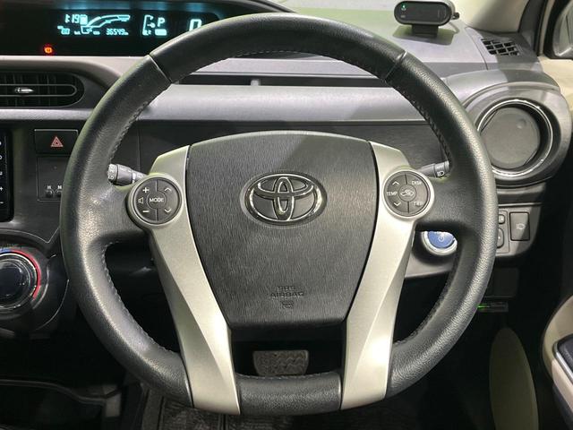 アクア G 純正ナビ フルセグ バックカメラ スマートキー LEDヘッド オートライト ETC 革巻きステアリング ステアリングスイッチ オートエアコン パワーウィンドウ アームレスト付センターコンソールボックス(11枚目)