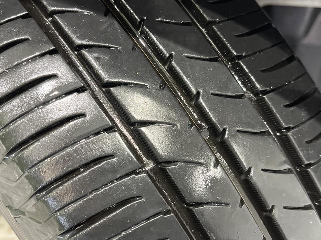 アクア G 純正ナビ フルセグ バックカメラ スマートキー LEDヘッド オートライト ETC 革巻きステアリング ステアリングスイッチ オートエアコン パワーウィンドウ アームレスト付センターコンソールボックス(51枚目)