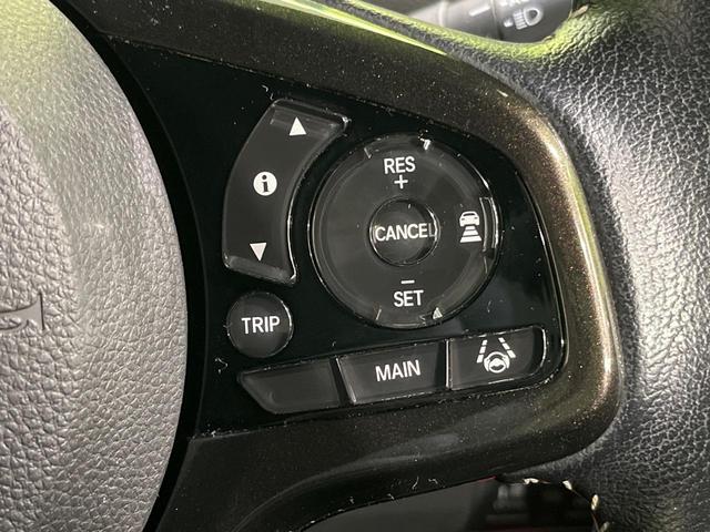 N-BOXカスタム G・Lターボホンダセンシング 純正ナビ バックカメラ 両側電動スライド ホンダセンシング アダプティブクルーズ LEDヘッド オートライト スマートキー ドラレコ ETC プラズマクラスター付オートエアコン 革巻きステアリング(7枚目)