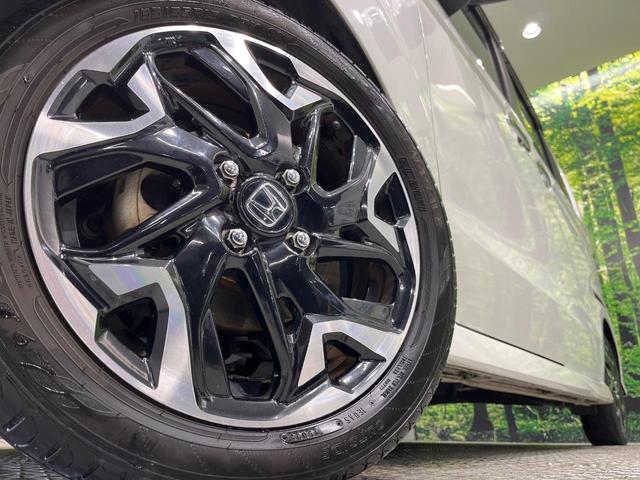 N-BOXカスタム G・Lターボホンダセンシング 純正ナビ バックカメラ 両側電動スライド ホンダセンシング アダプティブクルーズ LEDヘッド オートライト スマートキー ドラレコ ETC プラズマクラスター付オートエアコン 革巻きステアリング(12枚目)