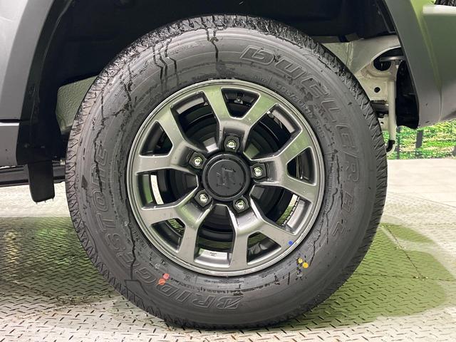 ジムニーノマド FC 登録済未使用車 4WD AT セーフティサポート アダプティブクルーズ LEDヘッド オートライト スマートキー シートヒーター アイドリングストップ オートエアコン 革巻きハンドル 電動格納ミラー(48枚目)