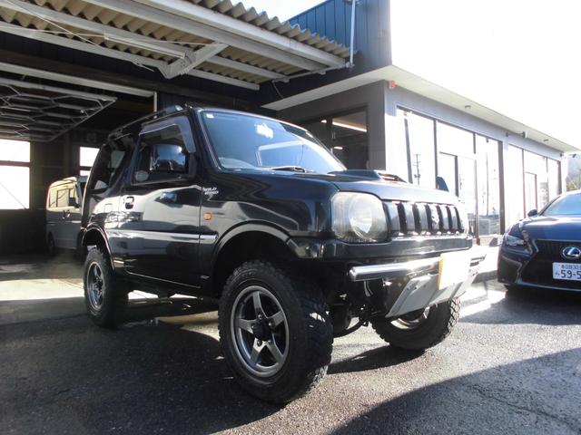 ジムニー ワイルドウインド　特別仕様車　６型　切替式４ＷＤ　オートマ　２インチリフトアップ　社外１６インチアルミホイール＆マッドタイヤ　社外Ｂｌｕｅｔｏｏｔｈ機能付きオーディオ　ルーフレール　シートヒーター　車検令和９年７月（13枚目）