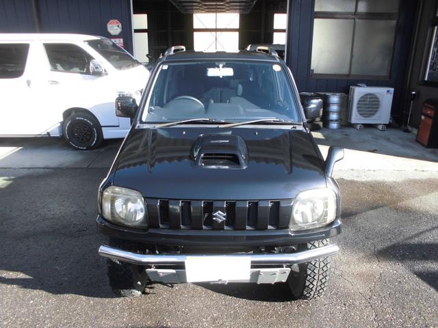 ジムニー ワイルドウインド　特別仕様車　６型　切替式４ＷＤ　オートマ　２インチリフトアップ　社外１６インチアルミホイール＆マッドタイヤ　社外Ｂｌｕｅｔｏｏｔｈ機能付きオーディオ　ルーフレール　シートヒーター　車検令和９年７月（14枚目）