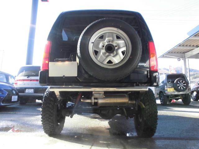 ジムニー ワイルドウインド　特別仕様車　６型　切替式４ＷＤ　オートマ　２インチリフトアップ　社外１６インチアルミホイール＆マッドタイヤ　社外Ｂｌｕｅｔｏｏｔｈ機能付きオーディオ　ルーフレール　シートヒーター　車検令和９年７月（21枚目）