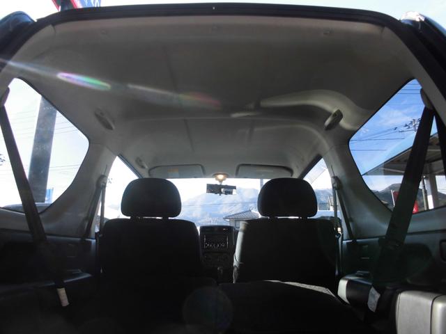 ジムニー ワイルドウインド　特別仕様車　６型　切替式４ＷＤ　オートマ　２インチリフトアップ　社外１６インチアルミホイール＆マッドタイヤ　社外Ｂｌｕｅｔｏｏｔｈ機能付きオーディオ　ルーフレール　シートヒーター　車検令和９年７月（37枚目）