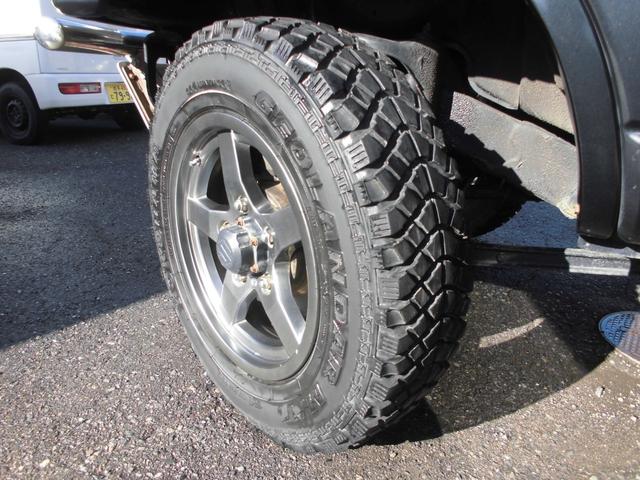 ジムニー ワイルドウインド　特別仕様車　６型　切替式４ＷＤ　オートマ　２インチリフトアップ　社外１６インチアルミホイール＆マッドタイヤ　社外Ｂｌｕｅｔｏｏｔｈ機能付きオーディオ　ルーフレール　シートヒーター　車検令和９年７月（53枚目）