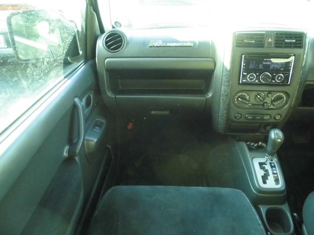 ジムニー ワイルドウインド　特別仕様車　６型　切替式４ＷＤ　オートマ　２インチリフトアップ　社外１６インチアルミホイール＆マッドタイヤ　社外Ｂｌｕｅｔｏｏｔｈ機能付きオーディオ　ルーフレール　シートヒーター　車検令和９年７月（59枚目）
