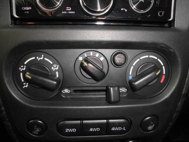 ジムニー ワイルドウインド　特別仕様車　６型　切替式４ＷＤ　オートマ　２インチリフトアップ　社外１６インチアルミホイール＆マッドタイヤ　社外Ｂｌｕｅｔｏｏｔｈ機能付きオーディオ　ルーフレール　シートヒーター　車検令和９年７月（66枚目）