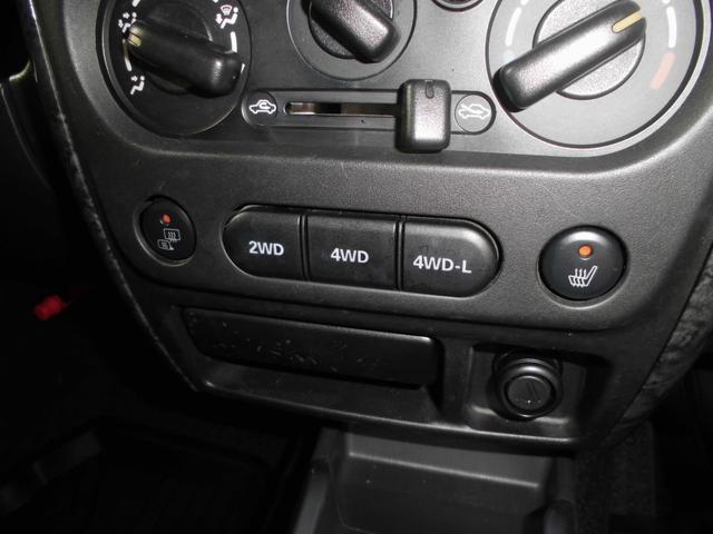 ジムニー ワイルドウインド　特別仕様車　６型　切替式４ＷＤ　オートマ　２インチリフトアップ　社外１６インチアルミホイール＆マッドタイヤ　社外Ｂｌｕｅｔｏｏｔｈ機能付きオーディオ　ルーフレール　シートヒーター　車検令和９年７月（67枚目）