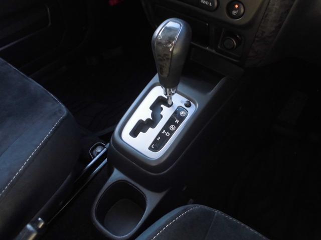 ジムニー ワイルドウインド　特別仕様車　６型　切替式４ＷＤ　オートマ　２インチリフトアップ　社外１６インチアルミホイール＆マッドタイヤ　社外Ｂｌｕｅｔｏｏｔｈ機能付きオーディオ　ルーフレール　シートヒーター　車検令和９年７月（68枚目）