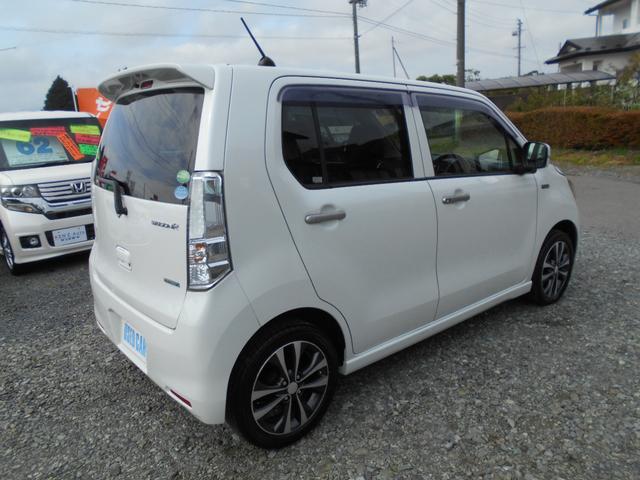 ワゴンＲ ２０周年記念車　４ＷＤ　タイミングチェーンエンジンＣＶＴオートマ　衝突軽減ブレーキ　横滑り防止装置　アイドリングストップ　スマホ連動ナビＴＶバックカメラＵＳＢソケット　革ハンドル　ＡＡＣ　シートヒーターシートリフター（4枚目）