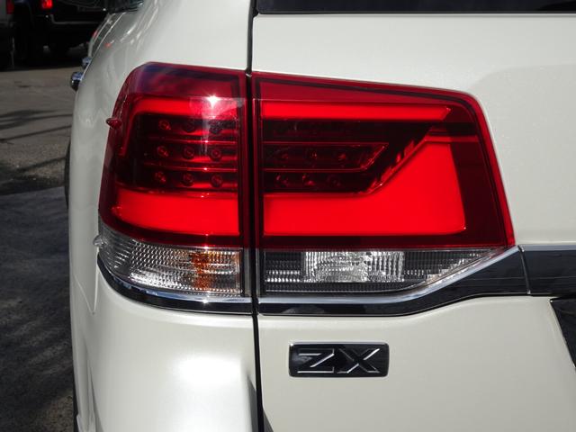 ランドクルーザー ＺＸ　後期型モデリスタスポイラーサンルーフレザーシート純正ナビバックカメラＥＴＣ純正エンジンスターターフォグランプリアルーフスポイラースマートキーウッドハンドル（32枚目）