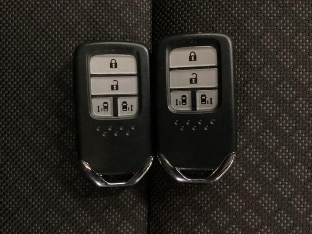 フリード G・ホンダセンシング 光触媒抗菌消臭施工済 ドラレコ ナビ リア席モニター シートヒーター ETC フルタイム4WD スマートキー&プッシュスタート 横滑り防止 地デジ ドライブレコーダー イモビライザー Aストップ(14枚目)