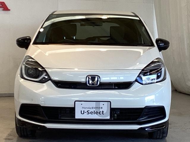 フィット e:HEVホームブラックスタイル 中古スタッドレスタイヤ、純正メモリーナビ、ドライブレコーダー前後装着+ETC付 当社デモカー Bカメラ DVD再生 ドラレコ アイドリングストップ オートクルーズコントロール LEDヘッドランプ(4枚目)