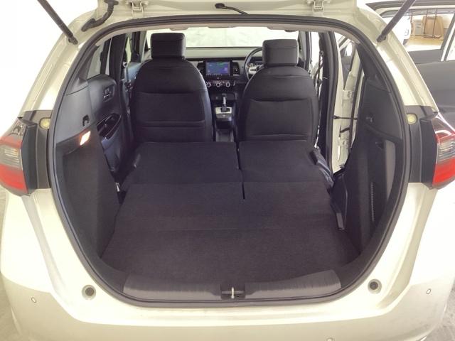 フィット ｅ：ＨＥＶホーム　光触媒抗菌消臭施工済　障害物センサー　ナビ　ＥＴＣ　前後誤発進抑制機能　クリソナ　助手席エアバッグ　運転席エアバッグ　アイドリングストップ　ＬＥＤライト　ＵＳＢ接続　バックカメラ　ＡＢＳ　フルセグＴＶ（23枚目）