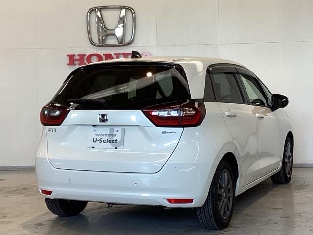 フィット e:HEVホーム 光触媒抗菌消臭施工済 ドラレコ前後 ナビ 障害物センサー ETC 前後誤発進抑制機能 クリソナ 助手席エアバッグ 運転席エアバッグ アイドリングストップ LEDライト USB接続 バックカメラ ABS(3枚目)