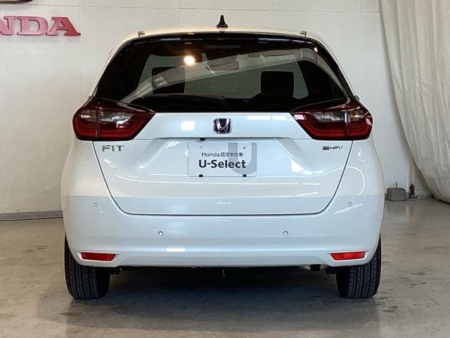 フィット e:HEVホーム 光触媒抗菌消臭施工済 ドラレコ前後 ナビ 障害物センサー ETC 前後誤発進抑制機能 クリソナ 助手席エアバッグ 運転席エアバッグ アイドリングストップ LEDライト USB接続 バックカメラ ABS(4枚目)