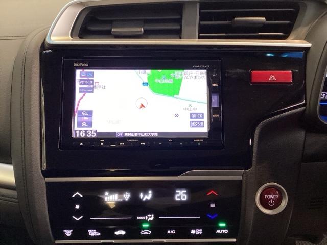 フィットハイブリッド Lパッケージ 光触媒抗菌消臭施工済 ナビ ETC 地デジフルセグTV サイドエアバック DVD再生 LED ECON バックカメラ オートクルーズコントロール イモビライザー ESC AUTOエアコン ABS(6枚目)