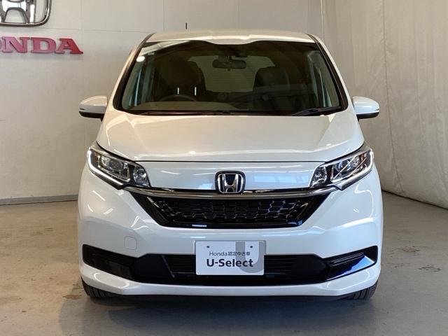 フリードハイブリッド ハイブリッド・Gホンダセンシング 光触媒抗菌消臭施工済 エンジンスターター ナビ シートヒーター ETC 軽減ブレーキ キーフリーシステム DVD再生可能 ECON 後カメラ Aクルーズ 地デジフルセグTV LEDヘッドランプ USB(2枚目)