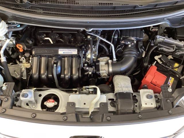 フリードハイブリッド ハイブリッド・Gホンダセンシング 光触媒抗菌消臭施工済 エンジンスターター ナビ シートヒーター ETC 軽減ブレーキ キーフリーシステム DVD再生可能 ECON 後カメラ Aクルーズ 地デジフルセグTV LEDヘッドランプ USB(23枚目)