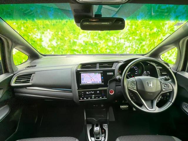 フィットハイブリッド ハイブリッド・Sホンダセンシング 新品タイヤ/純正エアロ/純正 SDナビ/ヘッドランプ LED/ETC/EBD付ABS/横滑り防止装置/アイドリングストップ/フルセグTV/エアバッグ 運転席/エアバッグ 助手席/エアバッグ サイド(4枚目)