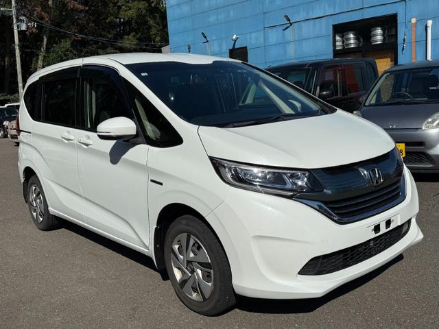 フリード＋ハイブリッド ４ＷＤ　ハイブリッドＧ・ホンダセンシング　ＣＤ／ＤＶＤ、ＥＴＣ、ＴＶワンセグ、衝突被害軽減システム、キーレスエントリー、スマートキー、アイドリングストップ、ＨＩＤオートライト、レーンアシスト、Ｂｌｕｅｔｏｏｔｈ接続（6枚目）