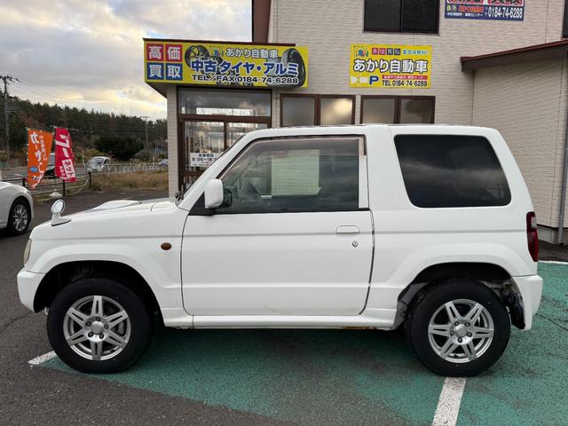 パジェロミニ 切り替え４ＷＤ　アクティブフィールドエディション　ＨＤＤナビ、ＣＤ／ＤＶＤ、ＥＴＣ、電動格納ミラー、キーレスエントリー、アルミホイール付き、（3枚目）