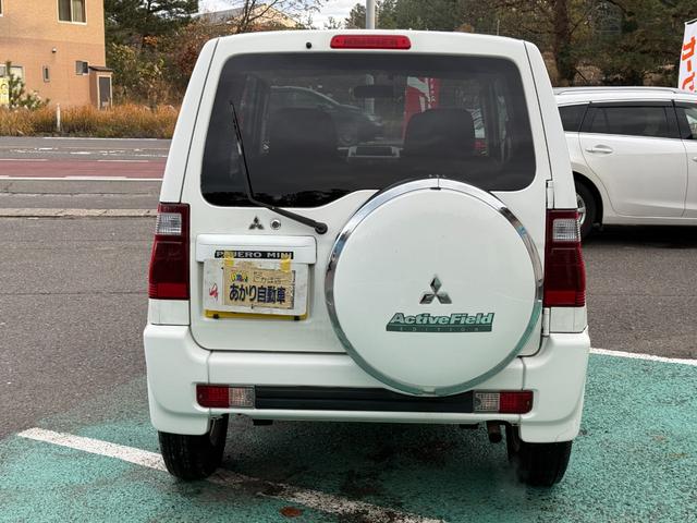 パジェロミニ 切り替え４ＷＤ　アクティブフィールドエディション　ＨＤＤナビ、ＣＤ／ＤＶＤ、ＥＴＣ、電動格納ミラー、キーレスエントリー、アルミホイール付き、（4枚目）