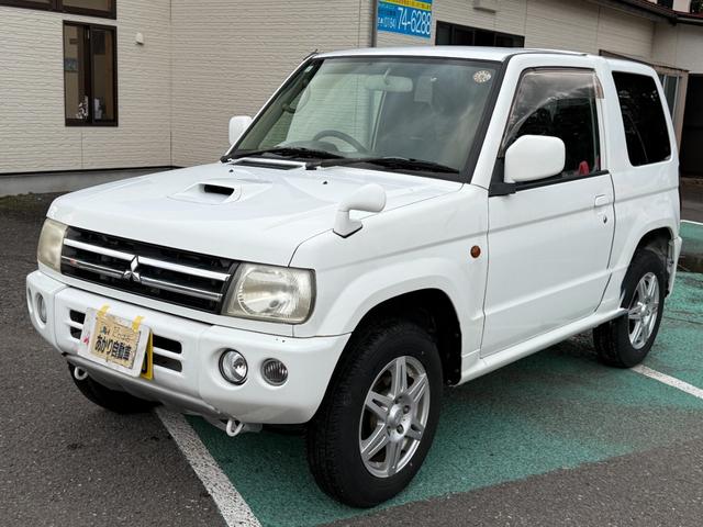 パジェロミニ 切り替え４ＷＤ　アクティブフィールドエディション　ＨＤＤナビ、ＣＤ／ＤＶＤ、ＥＴＣ、電動格納ミラー、キーレスエントリー、アルミホイール付き、（5枚目）