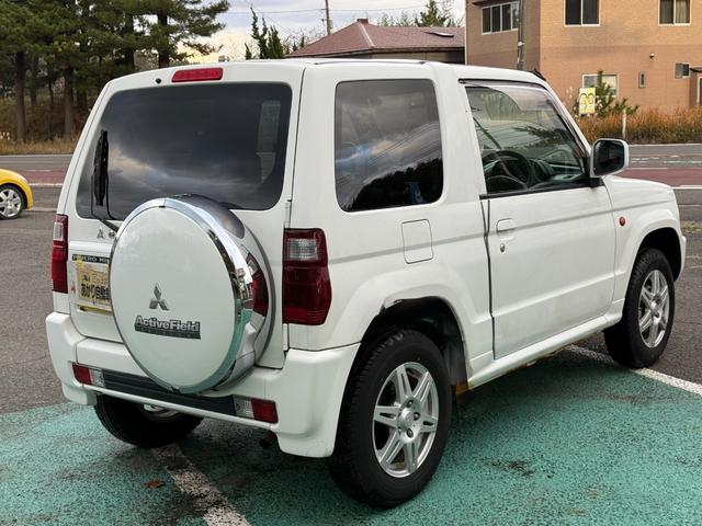 パジェロミニ 切り替え４ＷＤ　アクティブフィールドエディション　ＨＤＤナビ、ＣＤ／ＤＶＤ、ＥＴＣ、電動格納ミラー、キーレスエントリー、アルミホイール付き、（6枚目）