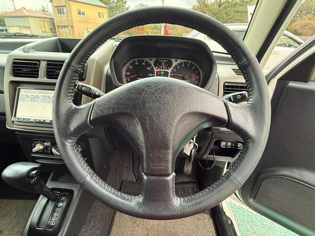 パジェロミニ 切り替え４ＷＤ　アクティブフィールドエディション　ＨＤＤナビ、ＣＤ／ＤＶＤ、ＥＴＣ、電動格納ミラー、キーレスエントリー、アルミホイール付き、（17枚目）