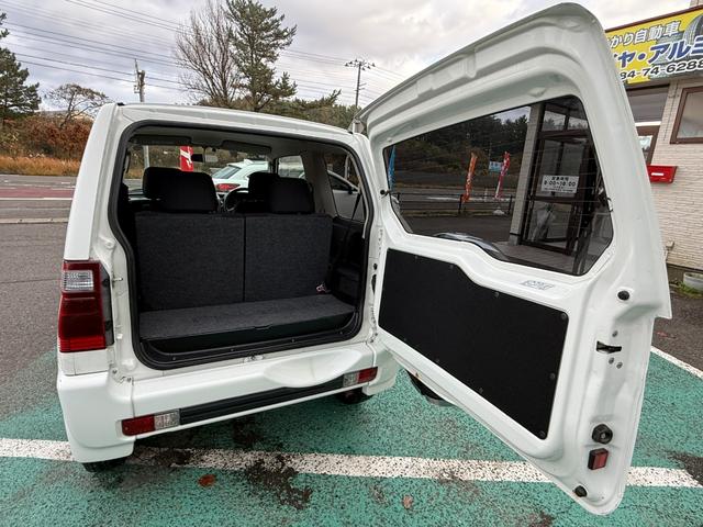 パジェロミニ 切り替え４ＷＤ　アクティブフィールドエディション　ＨＤＤナビ、ＣＤ／ＤＶＤ、ＥＴＣ、電動格納ミラー、キーレスエントリー、アルミホイール付き、（19枚目）