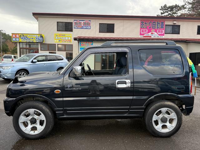ジムニー FISフリースタイルワールドカップリミテッド 切り替え4WD、CD、アルミホイール付き、電動格納ミラー、キ-レスエントリー(3枚目)