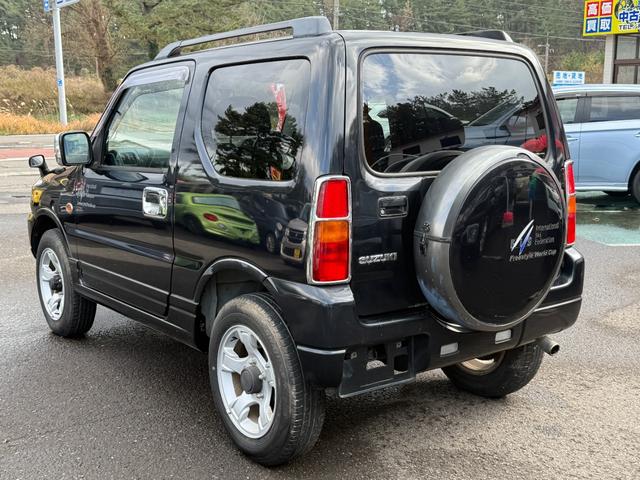 ジムニー FISフリースタイルワールドカップリミテッド 切り替え4WD、CD、アルミホイール付き、電動格納ミラー、キ-レスエントリー(4枚目)