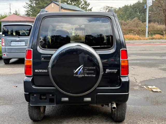 ジムニー FISフリースタイルワールドカップリミテッド 切り替え4WD、CD、アルミホイール付き、電動格納ミラー、キ-レスエントリー(8枚目)