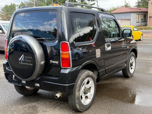 ジムニー FISフリースタイルワールドカップリミテッド 切り替え4WD、CD、アルミホイール付き、電動格納ミラー、キ-レスエントリー(9枚目)
