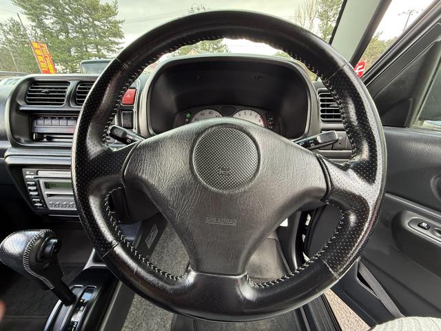 ジムニー FISフリースタイルワールドカップリミテッド 切り替え4WD、CD、アルミホイール付き、電動格納ミラー、キ-レスエントリー(15枚目)