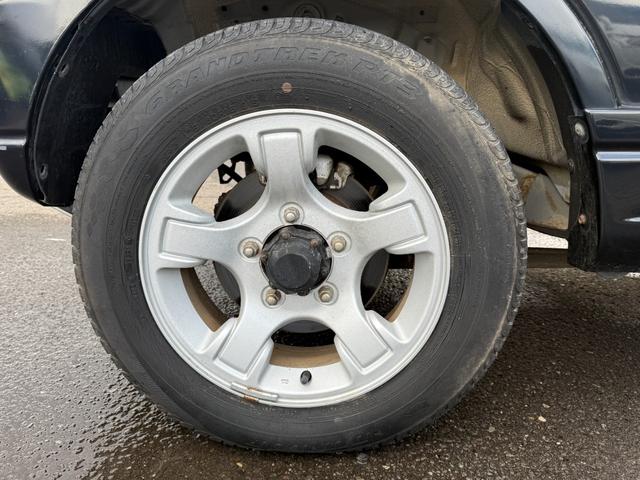 ジムニー FISフリースタイルワールドカップリミテッド 切り替え4WD、CD、アルミホイール付き、電動格納ミラー、キ-レスエントリー(22枚目)