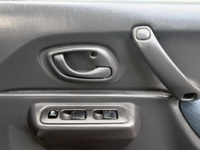 ジムニー FISフリースタイルワールドカップリミテッド 切り替え4WD、CD、アルミホイール付き、電動格納ミラー、キ-レスエントリー(30枚目)