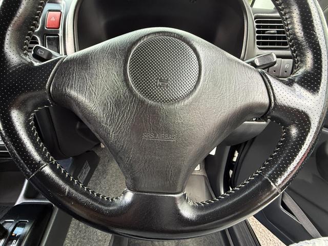 ジムニー FISフリースタイルワールドカップリミテッド 切り替え4WD、CD、アルミホイール付き、電動格納ミラー、キ-レスエントリー(31枚目)