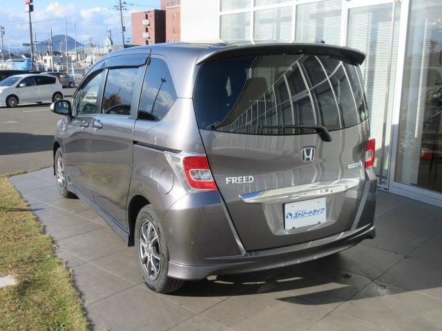 フリードハイブリッド ジャストセレクション 純正ナビ/フルセグTV/バックカメラ/ドライブレコーダー/ETC/スマートキー/HIDヘッドライト/オートライト/両側電動スライドドア/社外アルミホイール/電動格納ミラー(11枚目)
