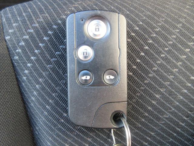 フリードハイブリッド ジャストセレクション 純正ナビ/フルセグTV/バックカメラ/ドライブレコーダー/ETC/スマートキー/HIDヘッドライト/オートライト/両側電動スライドドア/社外アルミホイール/電動格納ミラー(36枚目)