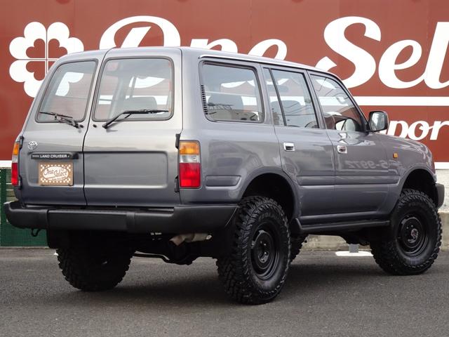 ランドクルーザー80 GX HZJ81V 後期型純正ナロー リア観音ドア グレーメタリック 輸出仕様 5速マニュアル パートタイム4WD 3インチリフトUP PW集中ドアロック 前後バンパーサイドSラプターライナー新品255MT(2枚目)